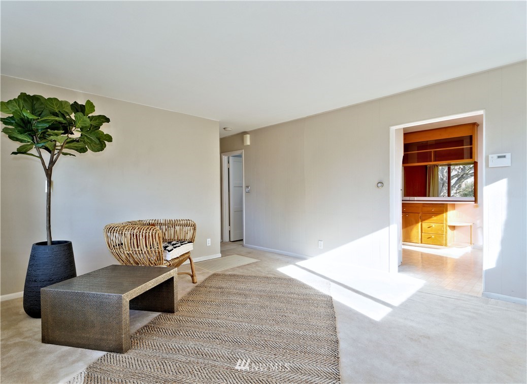 2189 Northeast 9th Place Renton, WA 98056 - Photo 3 of 21 a living room with furniture and a potted plant