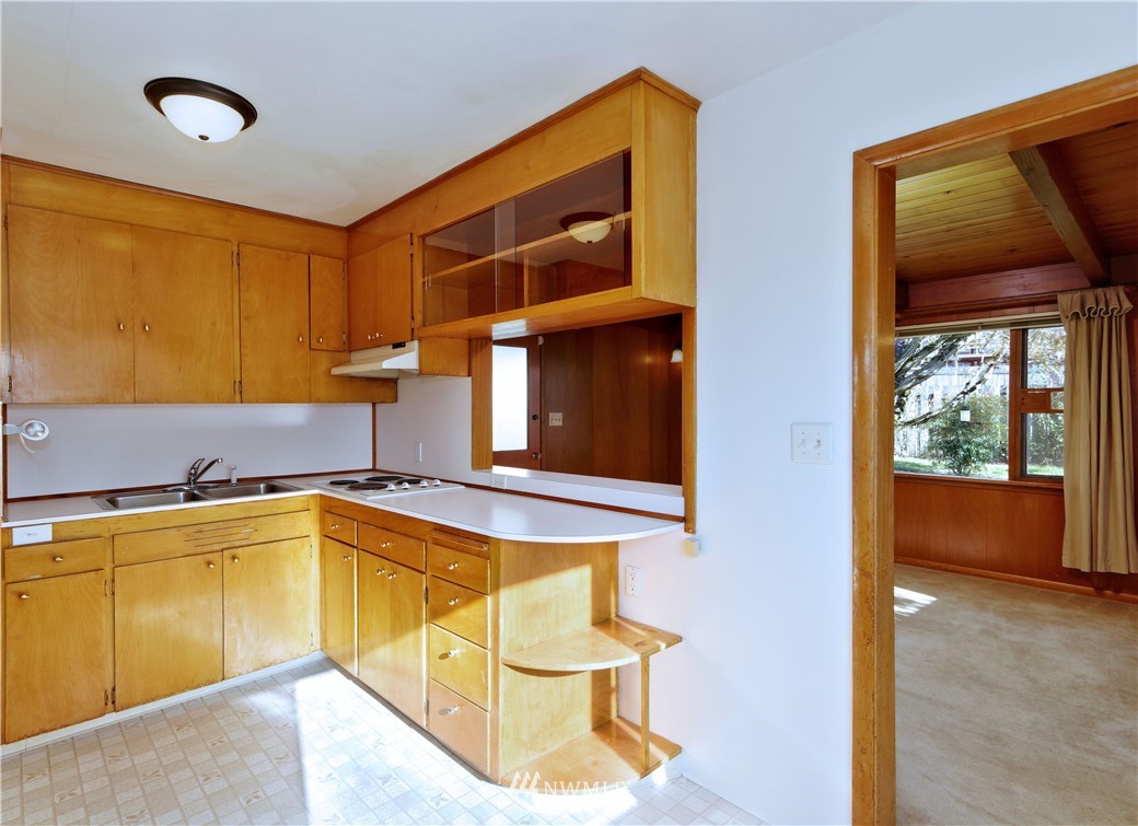 2189 Northeast 9th Place Renton, WA 98056 - Photo 7 of 21 a view of a kitchen with a sink and cabinets