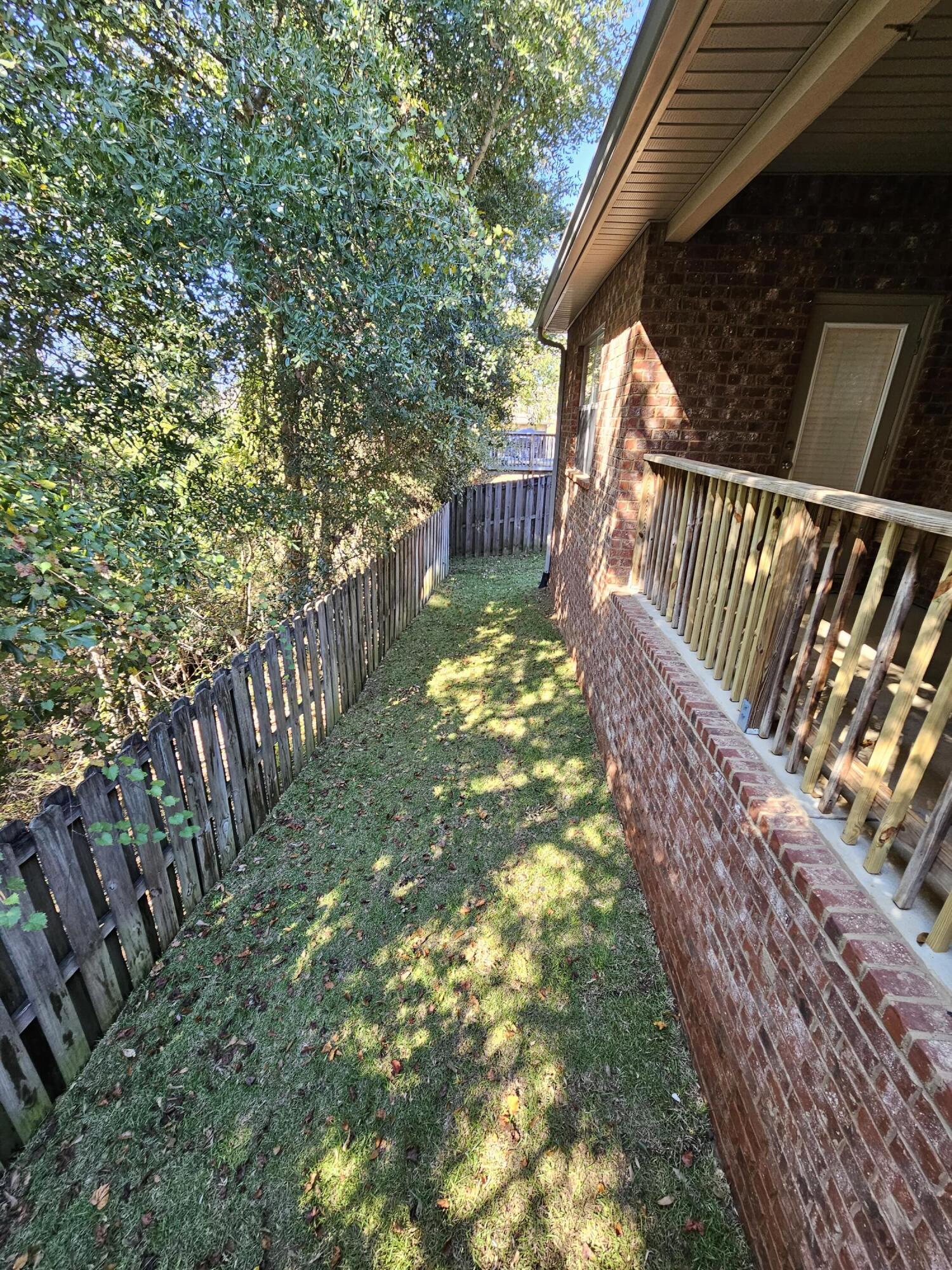 660 Red Fern Road Crestview, FL 32536 - Photo 21 of 22 a view of balcony with wooden floor