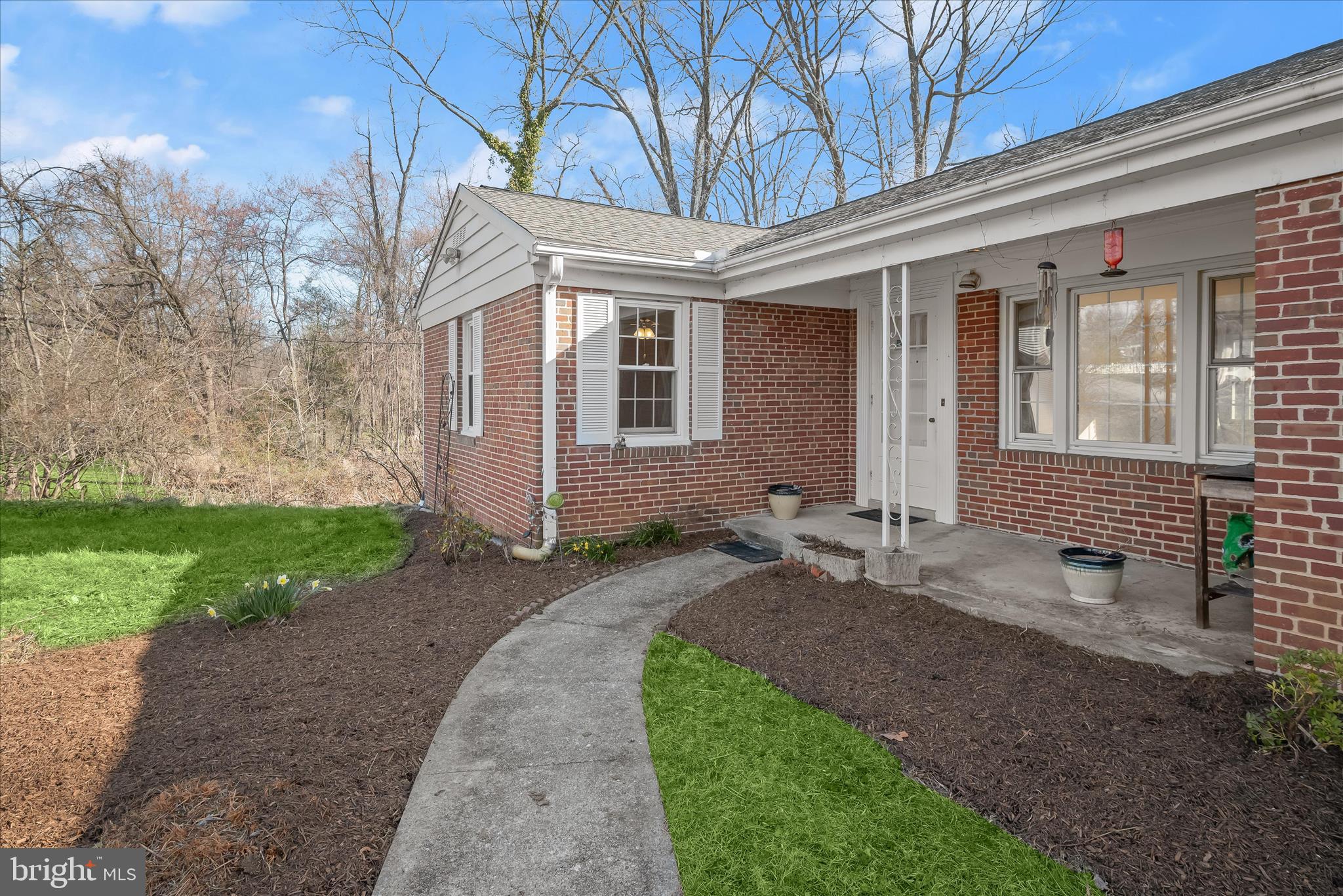 3637 Sussex Road Pikesville, MD 21207 - Photo 2 of 33 a front view of a house with garden