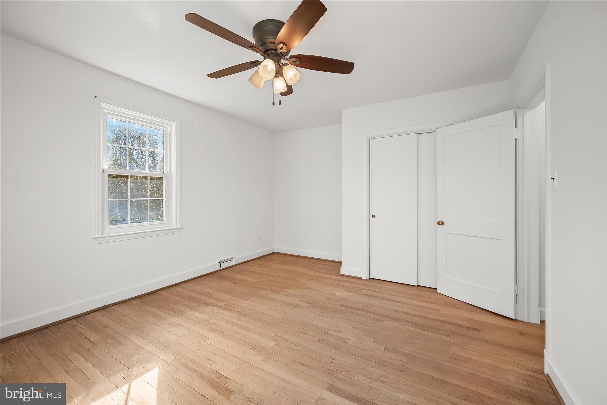 3637 Sussex Road Pikesville, MD 21207 - Photo 22 of 33 a view of an empty room with a window