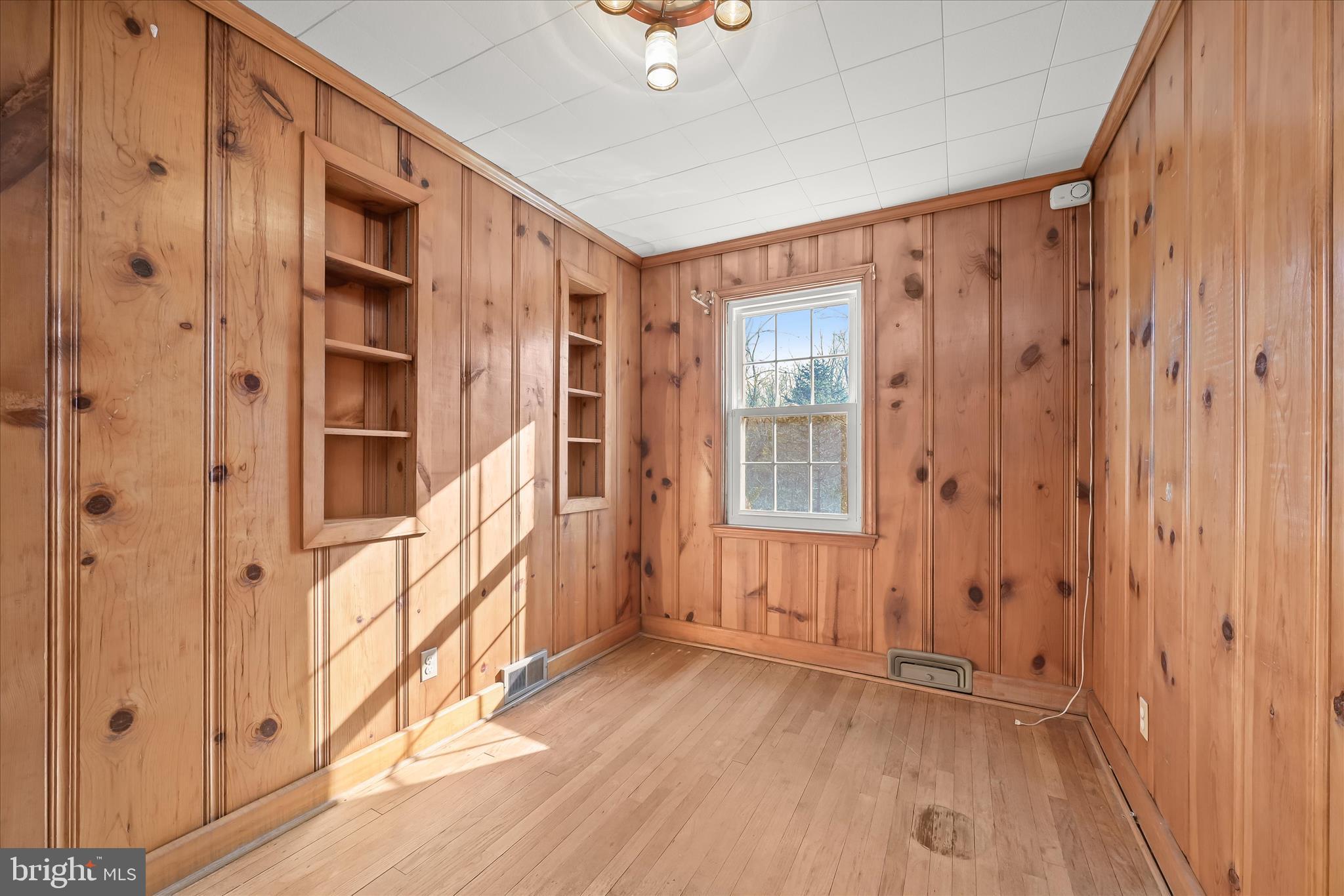 3637 Sussex Road Pikesville, MD 21207 - Photo 25 of 33 a view of an entryway with wooden floor and stairs