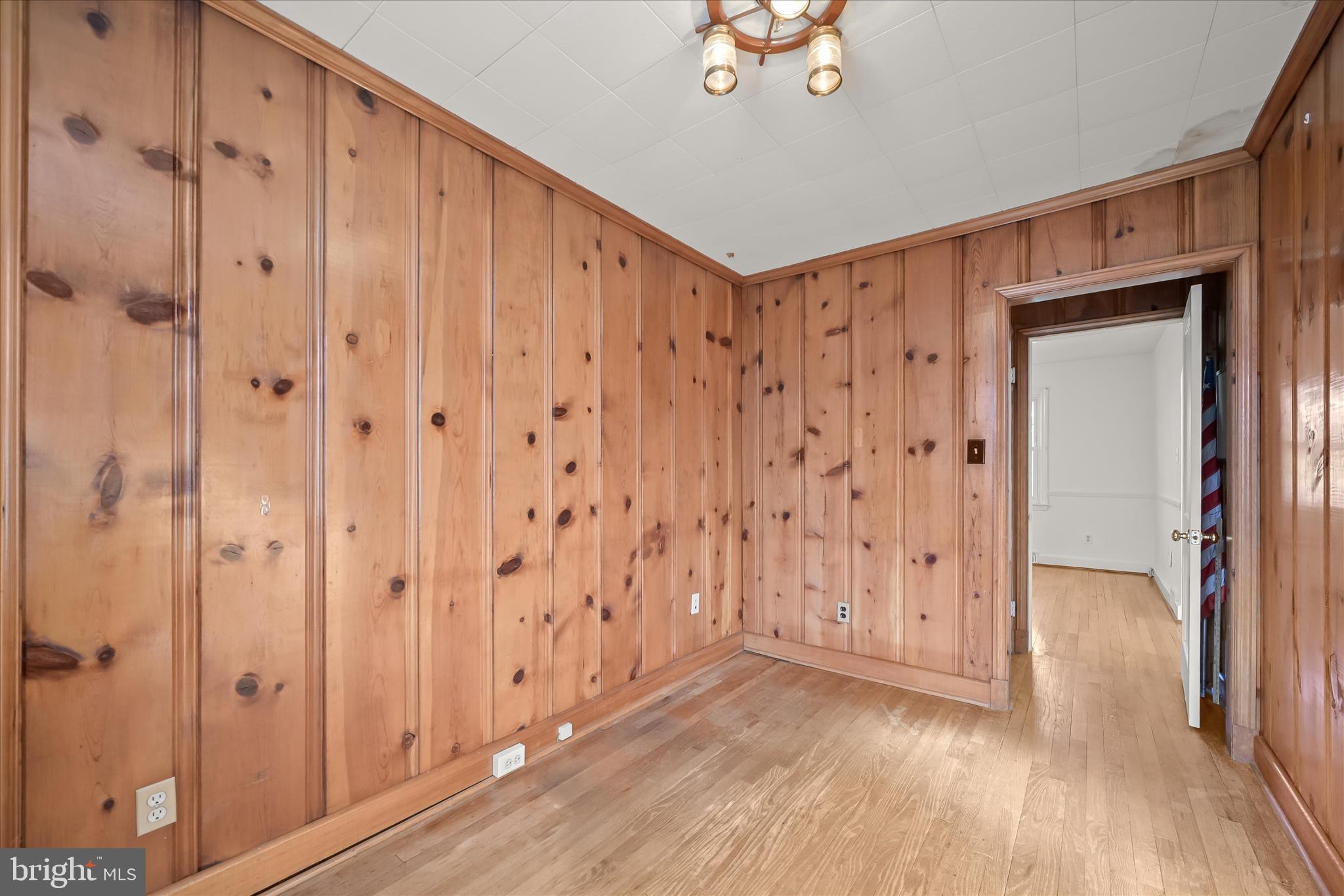 3637 Sussex Road Pikesville, MD 21207 - Photo 26 of 33 a view of a hallway with wooden floor