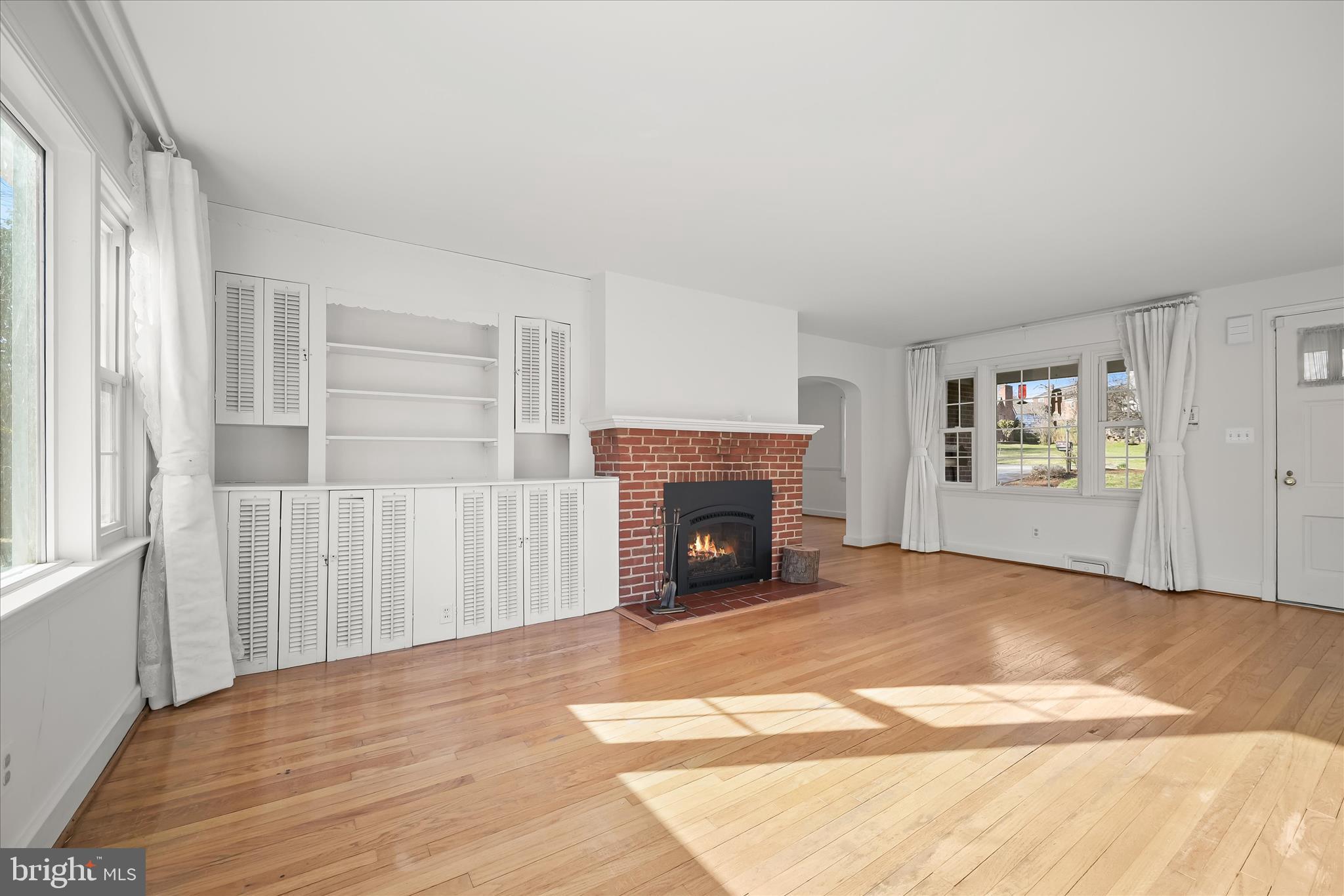 3637 Sussex Road Pikesville, MD 21207 - Photo 10 of 33 a view of a livingroom with a fireplace