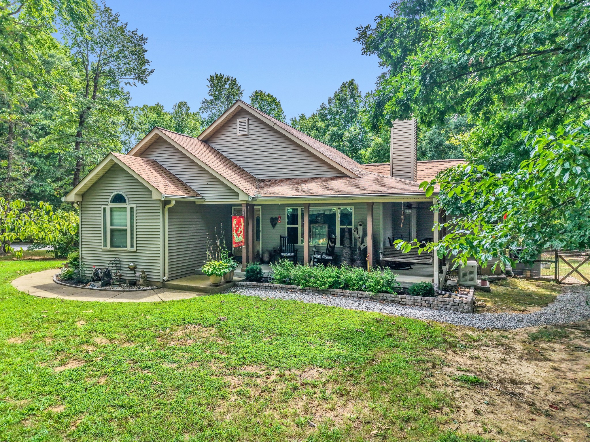 7197 Highland Road Portland, TN 37148 - Photo 2 of 92 a view of a house with a yard and sitting area