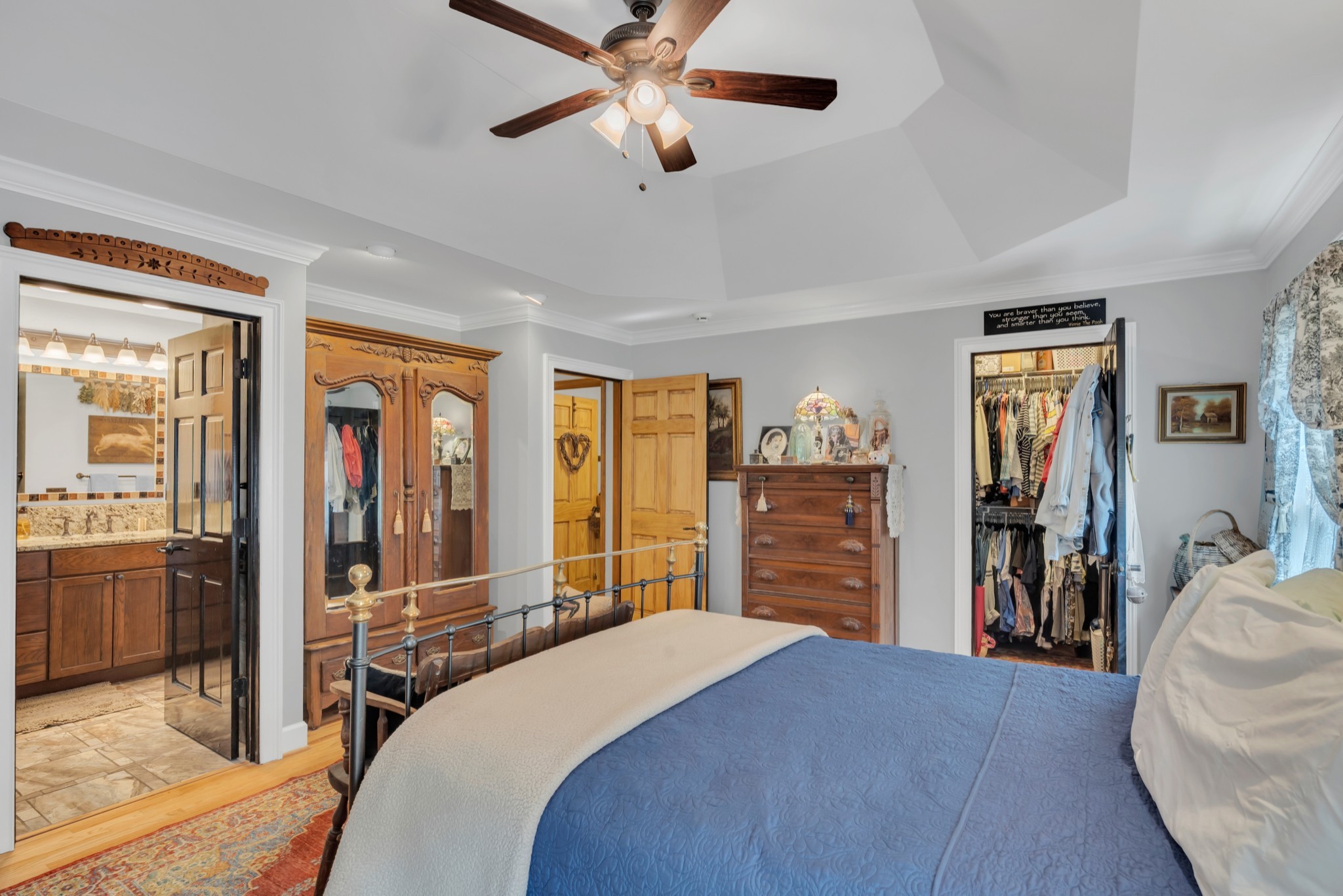 7197 Highland Road Portland, TN 37148 - Photo 26 of 92 a bedroom with a bed and a flat tv screen on dresser
