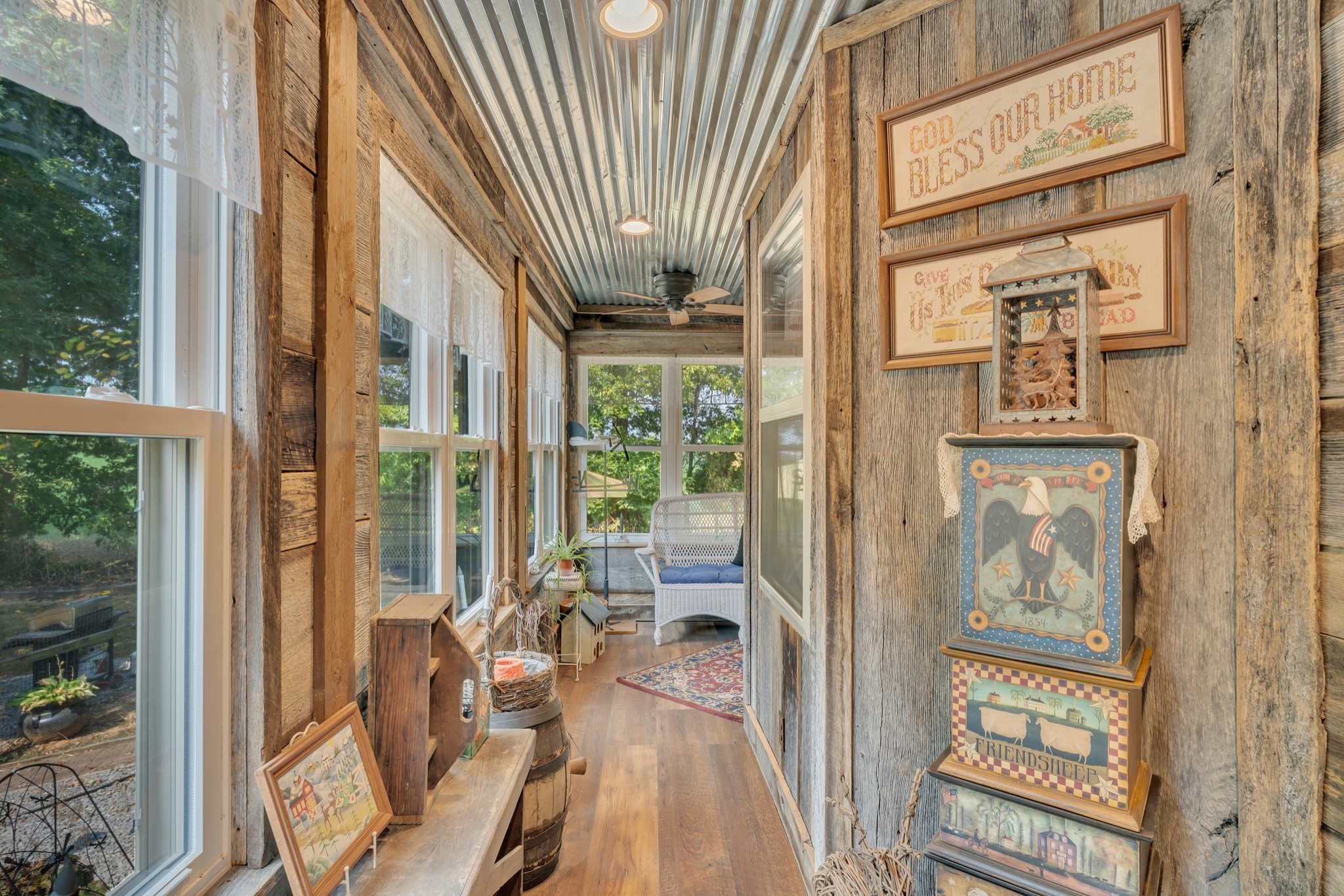 7197 Highland Road Portland, TN 37148 - Photo 33 of 92 a view of an entryway with wooden floor and windows