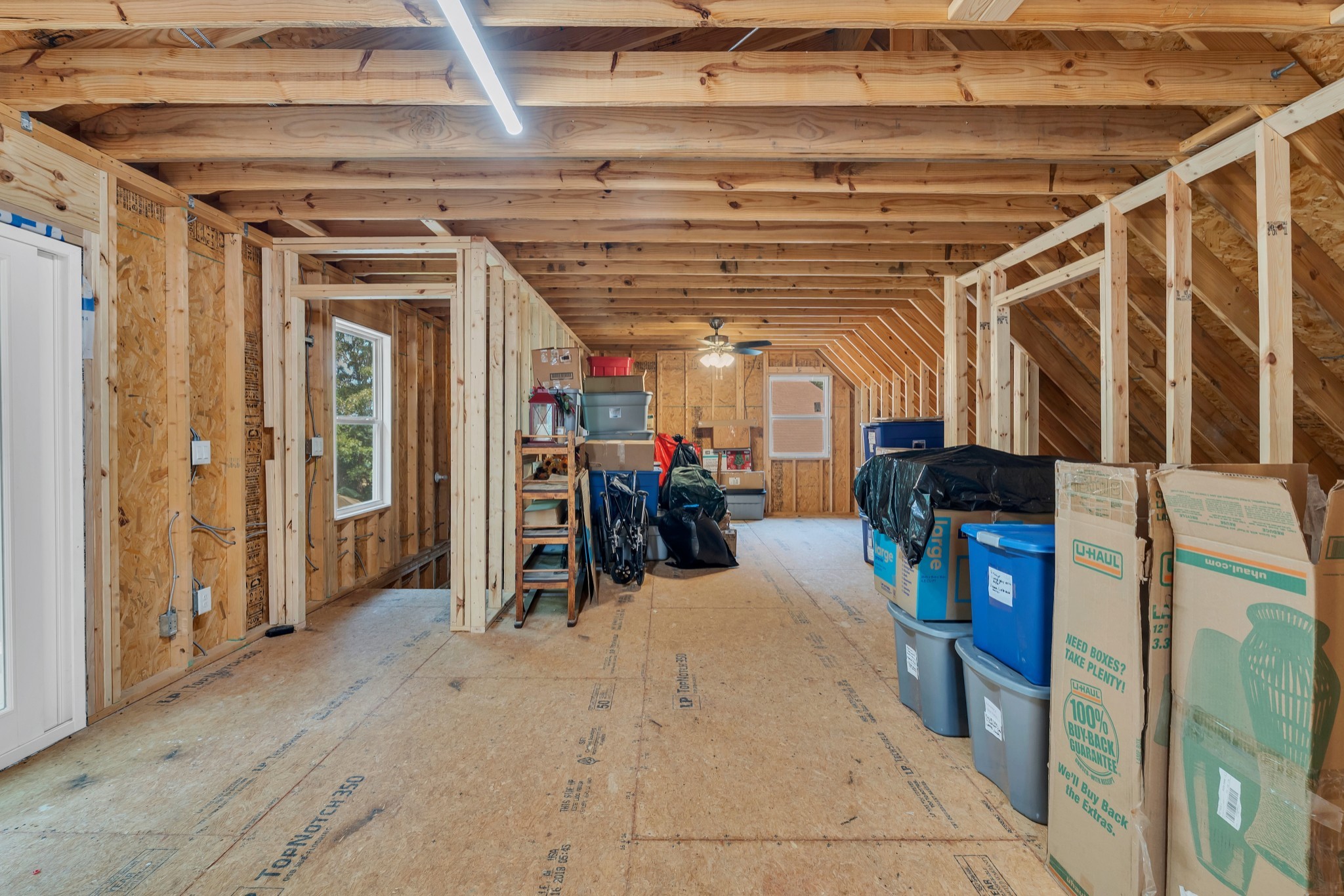 7197 Highland Road Portland, TN 37148 - Photo 41 of 92 a view of a storage room with a lot of stuff