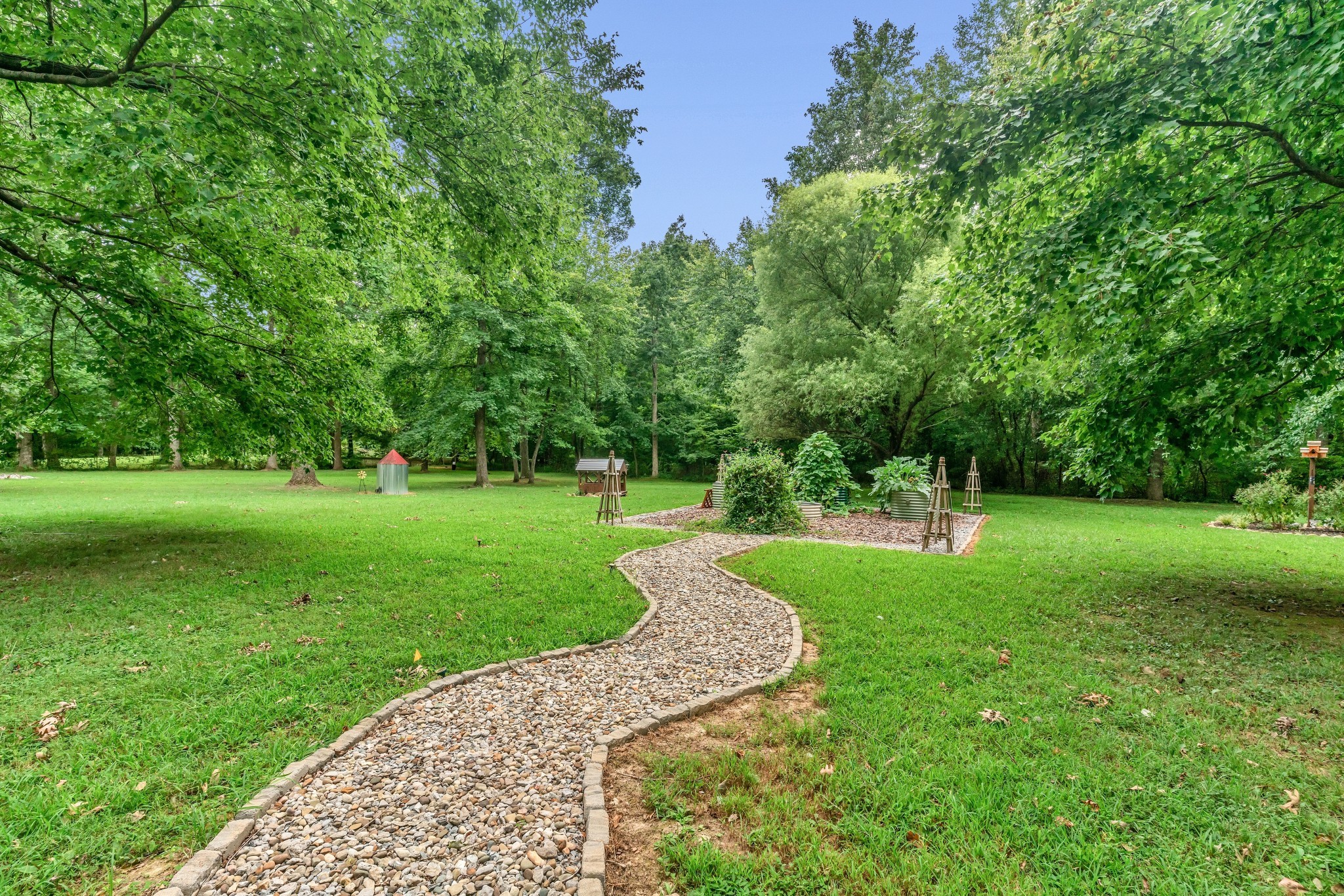 7197 Highland Road Portland, TN 37148 - Photo 57 of 92 a view of a garden with trees