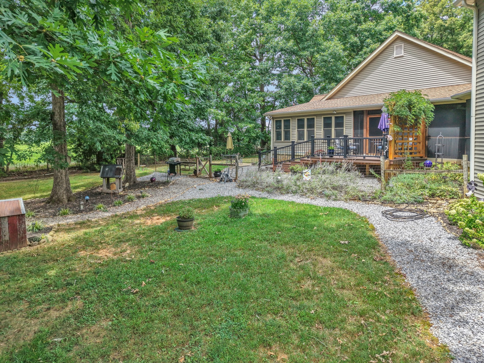 7197 Highland Road Portland, TN 37148 - Photo 76 of 92 a view of house with a big yard and large trees