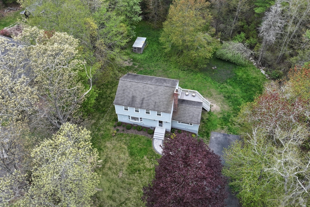 59 First Parish Road Norwell, MA 02061 - Photo 34 of 37 an aerial view of a house with a yard