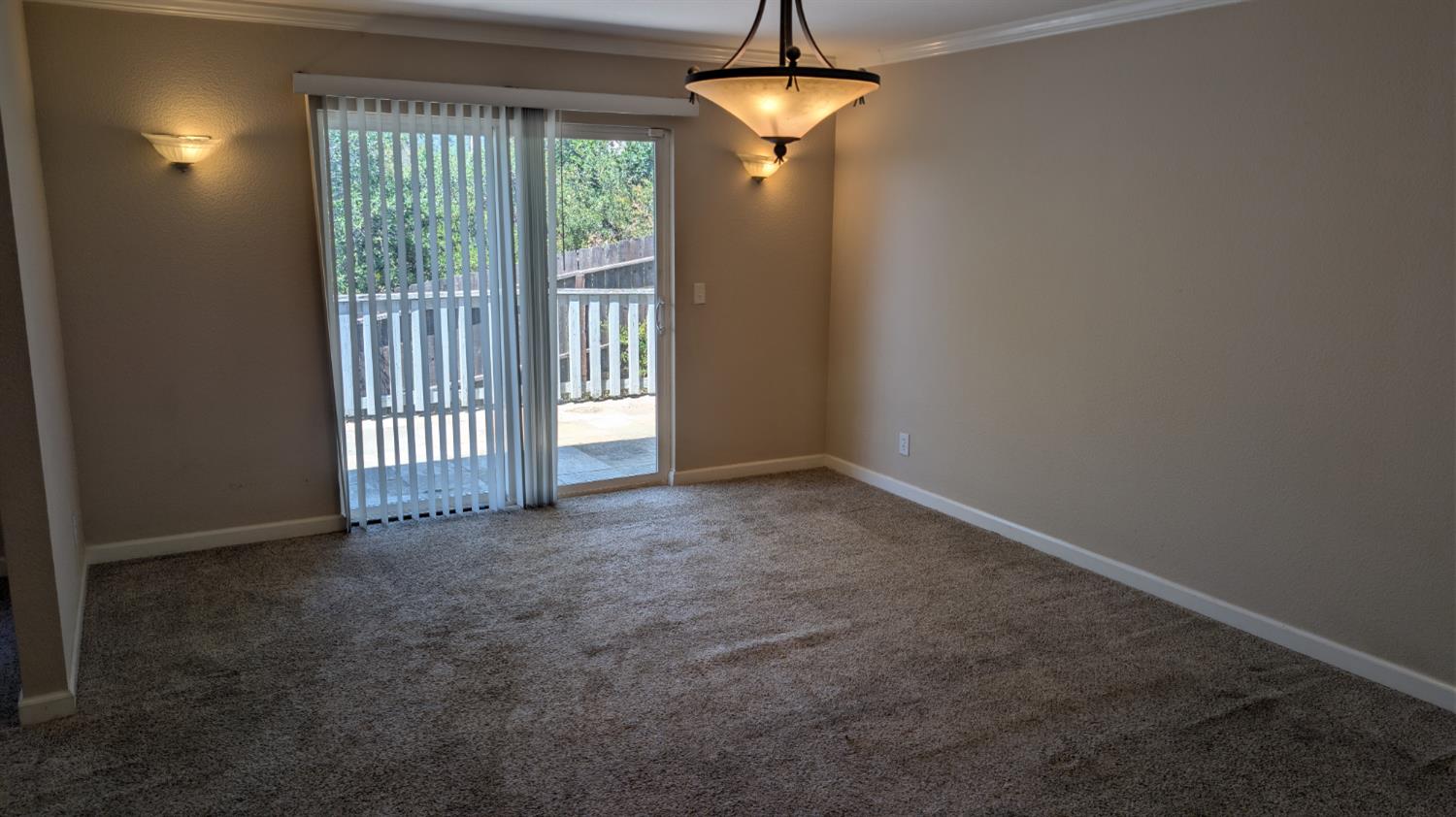 3248 Sudbury Road Cameron Park, CA 95682 - Photo 14 of 41 an empty room with windows and entrance