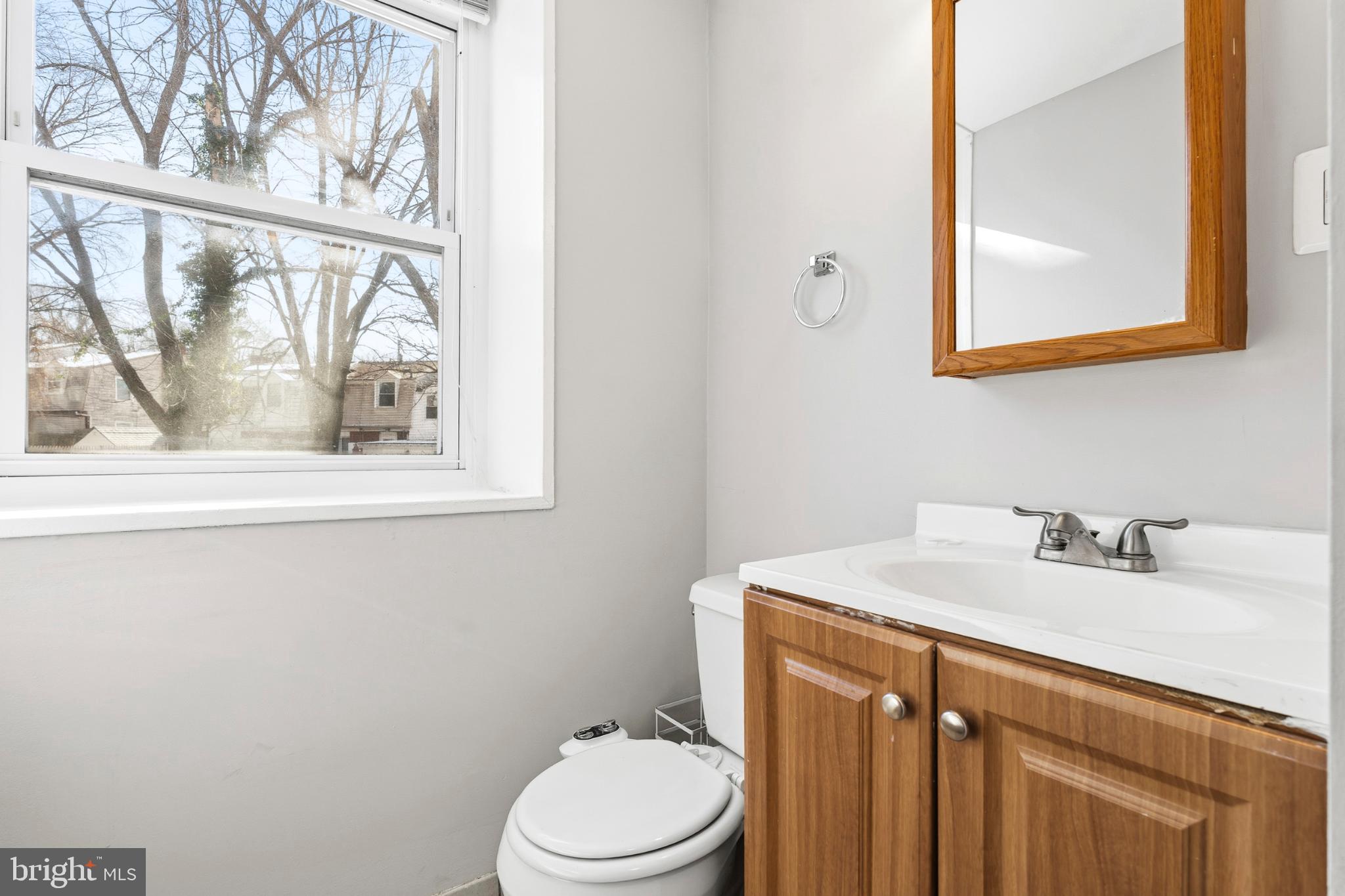 7713 Burnside Road Landover, MD 20785 - Photo 19 of 23 Bright and airy bathroom with natural light.