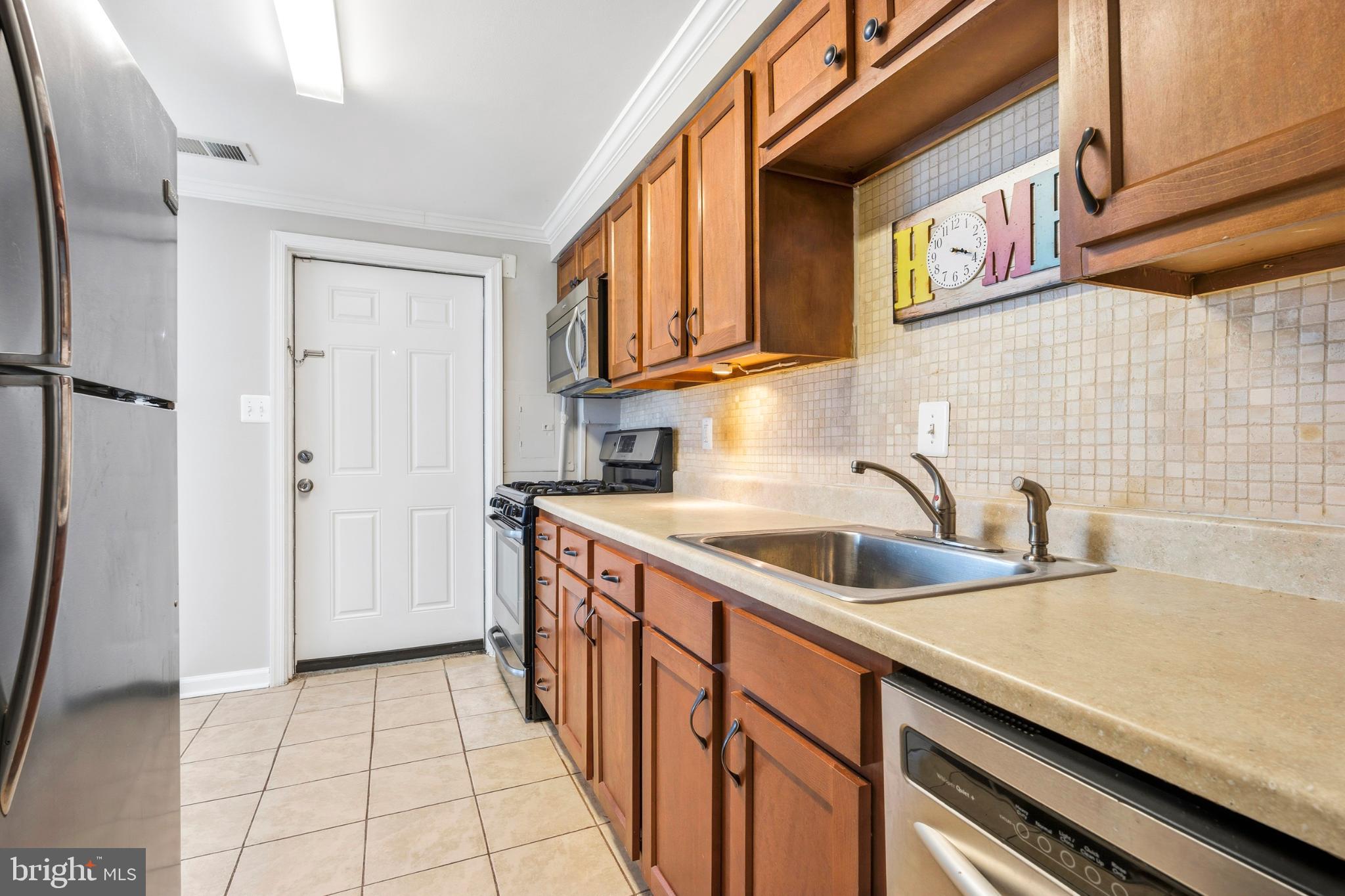 7713 Burnside Road Landover, MD 20785 - Photo 7 of 23 Charming kitchen with modern finishes.