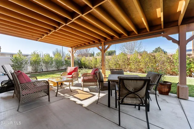 a view of chairs and tables in patio