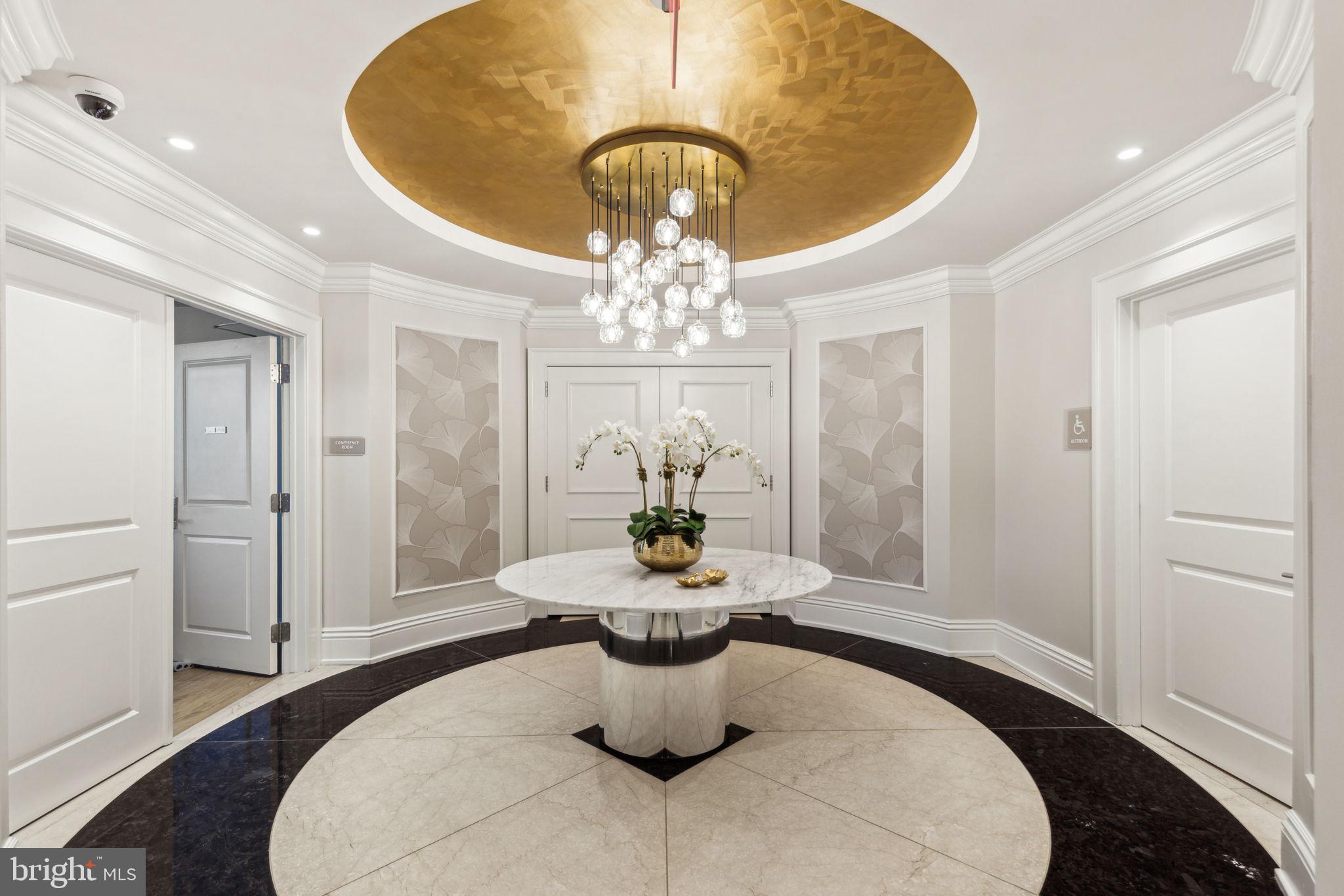 50 South 16th Street, Unit 5306 Philadelphia, PA 19103 - Photo 34 of 40 a dining room with table and chairs