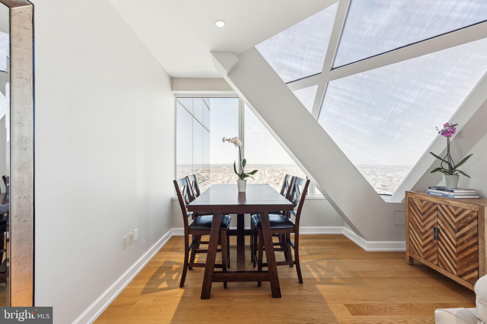 50 South 16th Street, Unit 5306 Philadelphia, PA 19103 - Photo 7 of 40 a view of a dining room with furniture