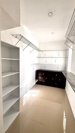 a view of entryway with cabinet