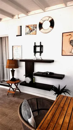 a view of workspace and wooden floor