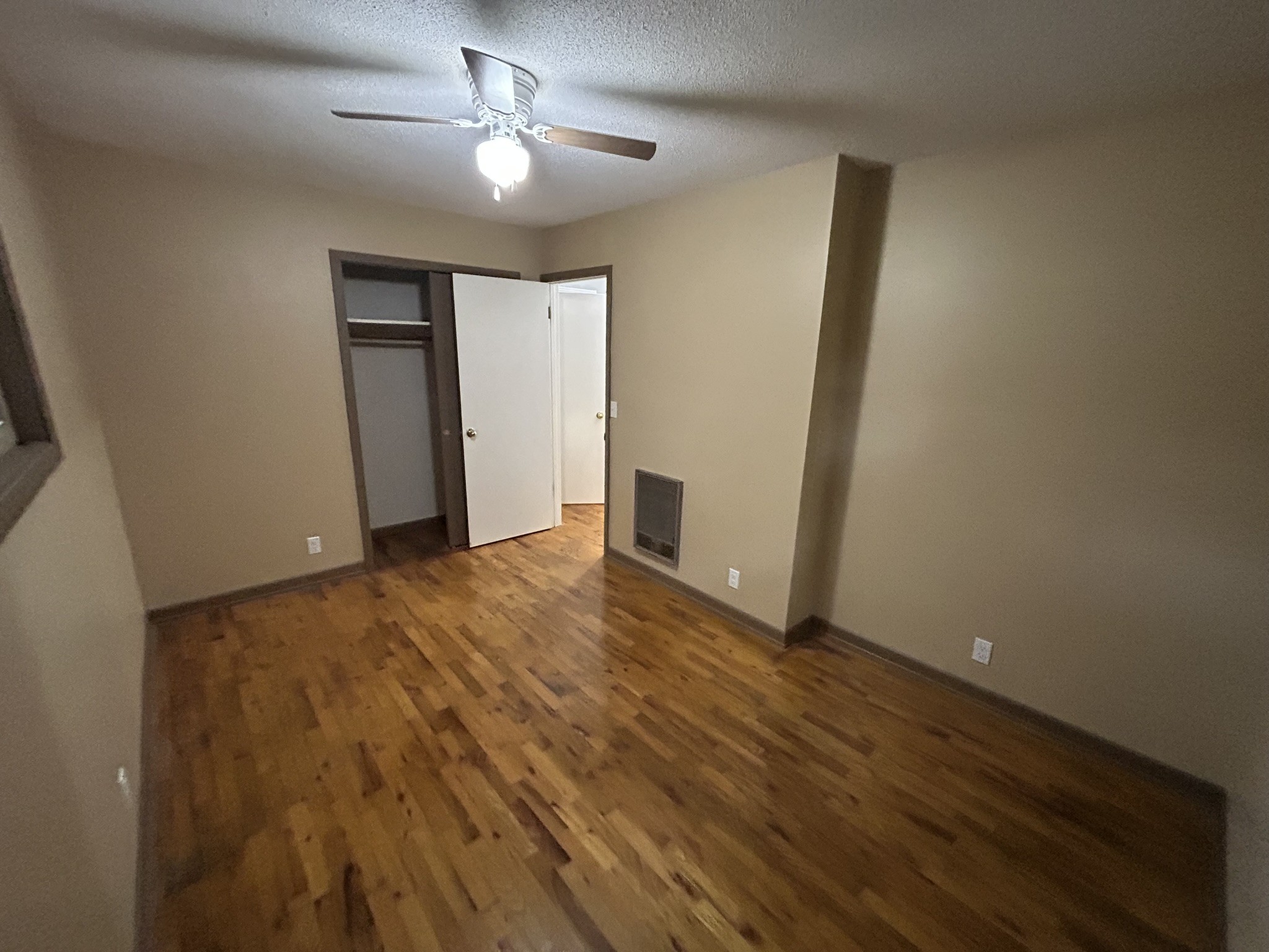 181 Jones Street Huntingdon, TN 38344 - Photo 15 of 21 a view of empty room with wooden floor