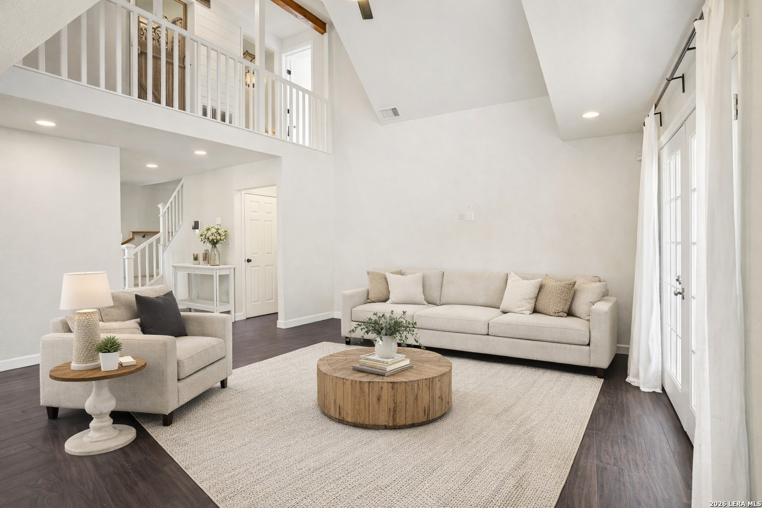 706 Quail Run Lytle, TX 78052 - Photo 14 of 51 a living room with furniture and a mirror