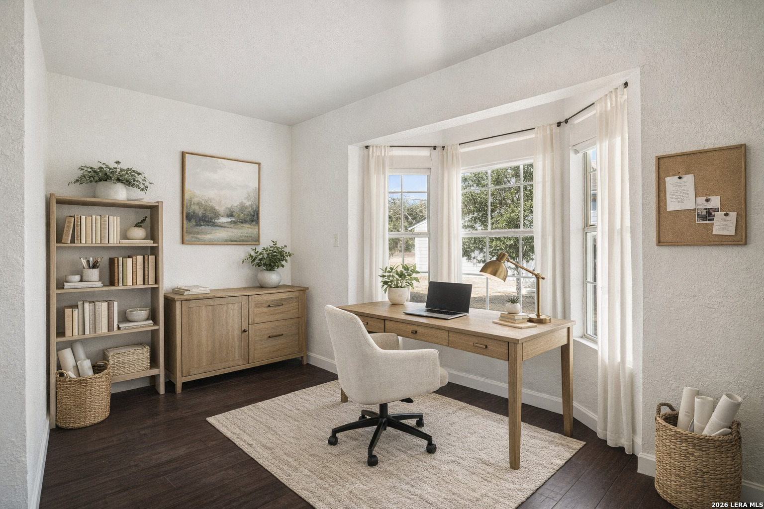 706 Quail Run Lytle, TX 78052 - Photo 28 of 51 a view of a workspace with furniture and a window