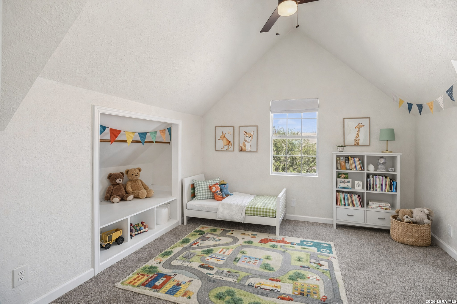 706 Quail Run Lytle, TX 78052 - Photo 31 of 51 a living room with furniture and book shelf
