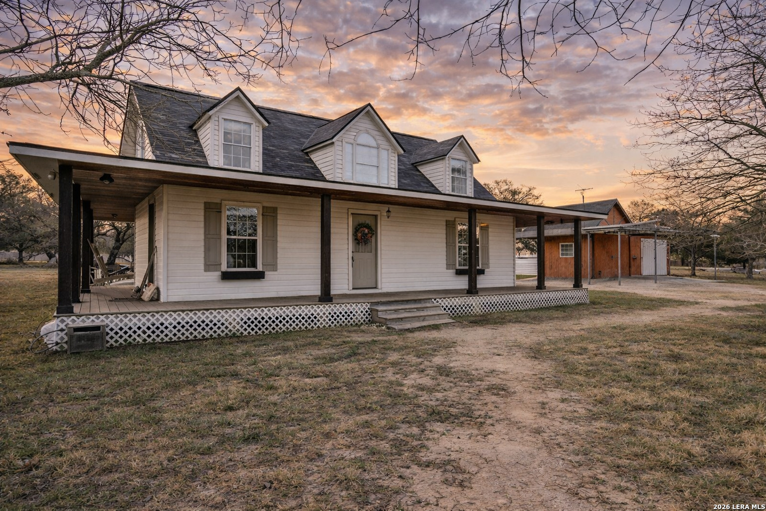 706 Quail Run Lytle, TX 78052 - Photo 6 of 51 a front view of a house with a yard