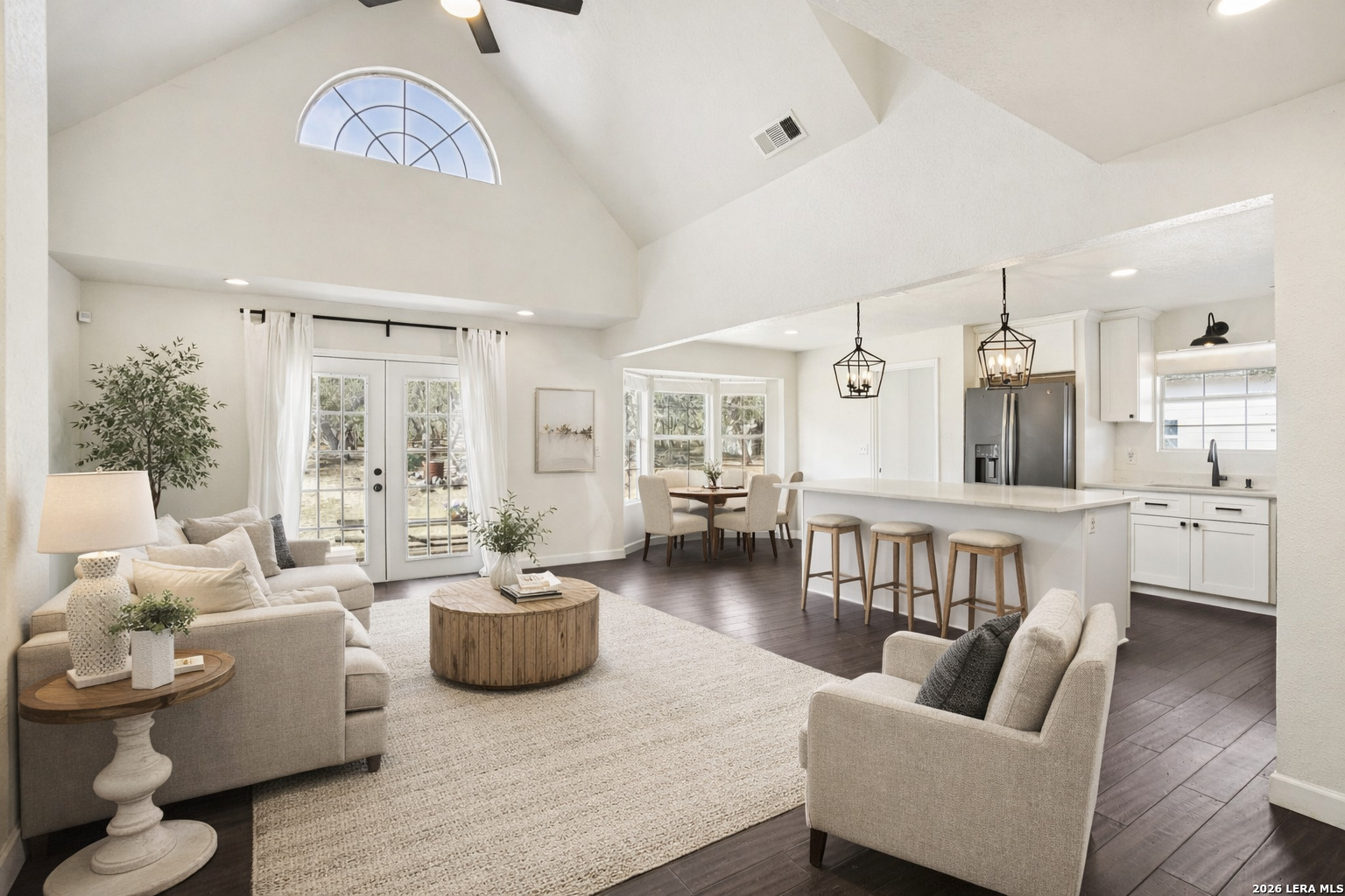 706 Quail Run Lytle, TX 78052 - Photo 9 of 51 a living room with furniture and a wooden floor