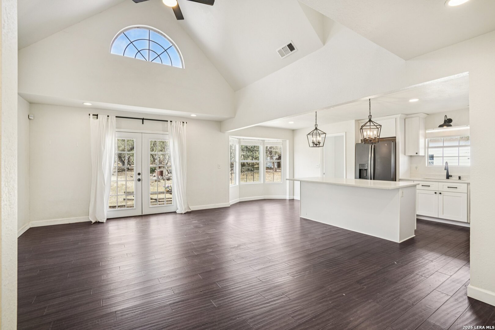 706 Quail Run Lytle, TX 78052 - Photo 10 of 51 a view of a kitchen with furniture and wooden floor