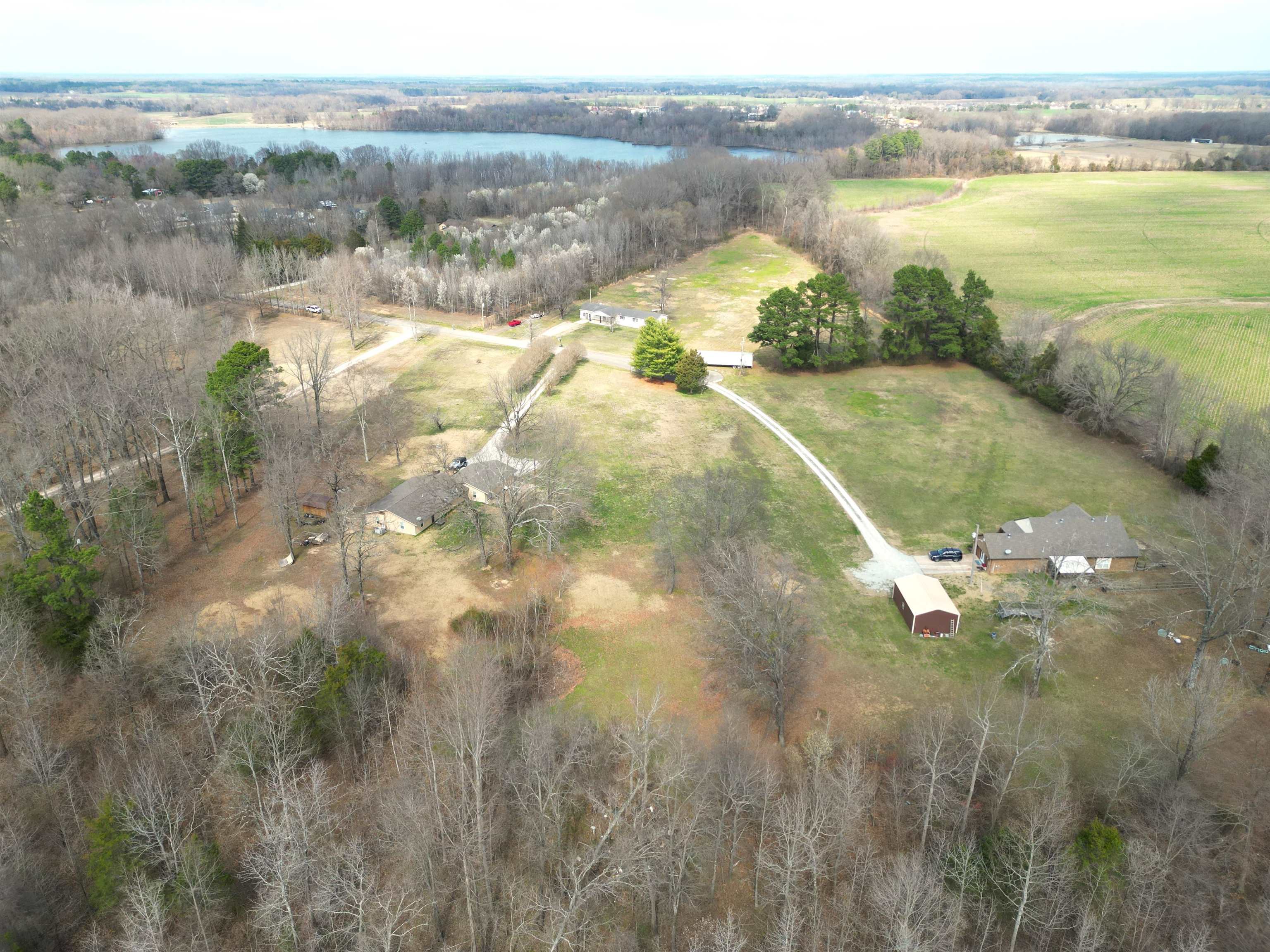 1240 Joann Road Somerville, TN 38068 - Photo 4 of 12 Aerial view of sparsely populated area featuring a large body of water