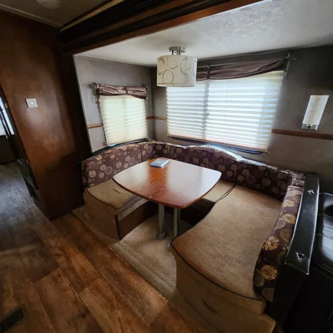 a room with furniture and window