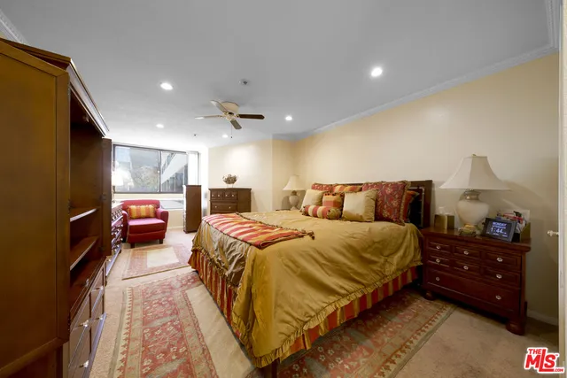 a bedroom with a bed and a closet