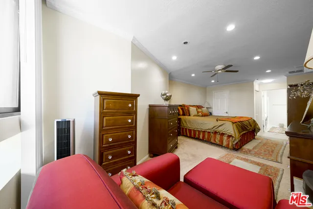 a spacious bathroom with a sink double vanity granite tub shower and a mirror