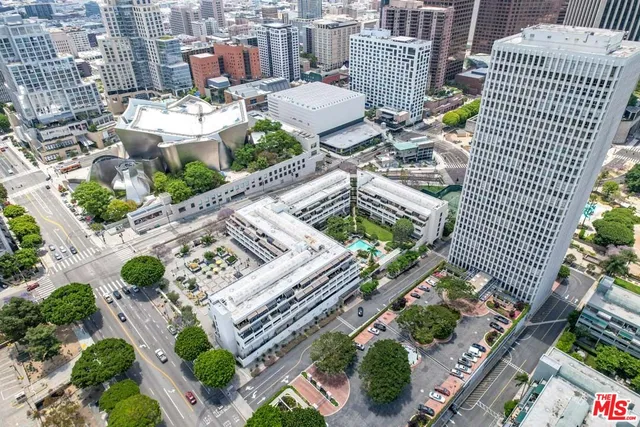 a view of a swimming pool with outdoor seating