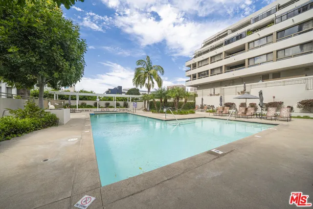 a view of a backyard with a patio