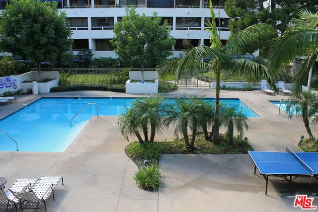a view of a street with sitting area