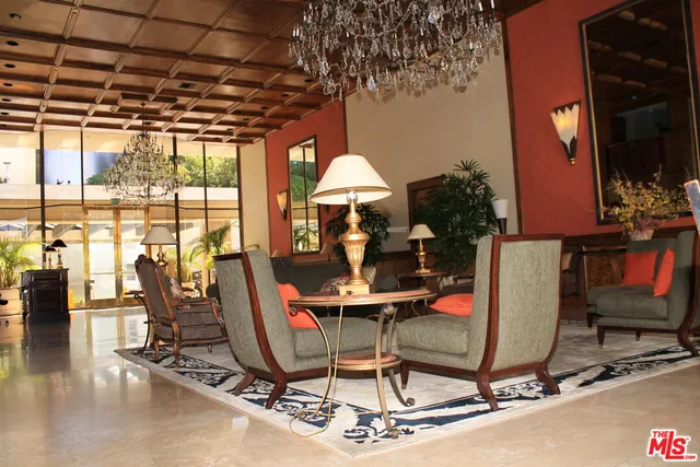 a work room with furniture and wooden floor