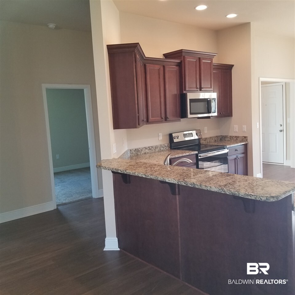 14606 Troon Drive Foley, AL 36535 - Photo 10 of 18 Opens into family room. Great for entertaining