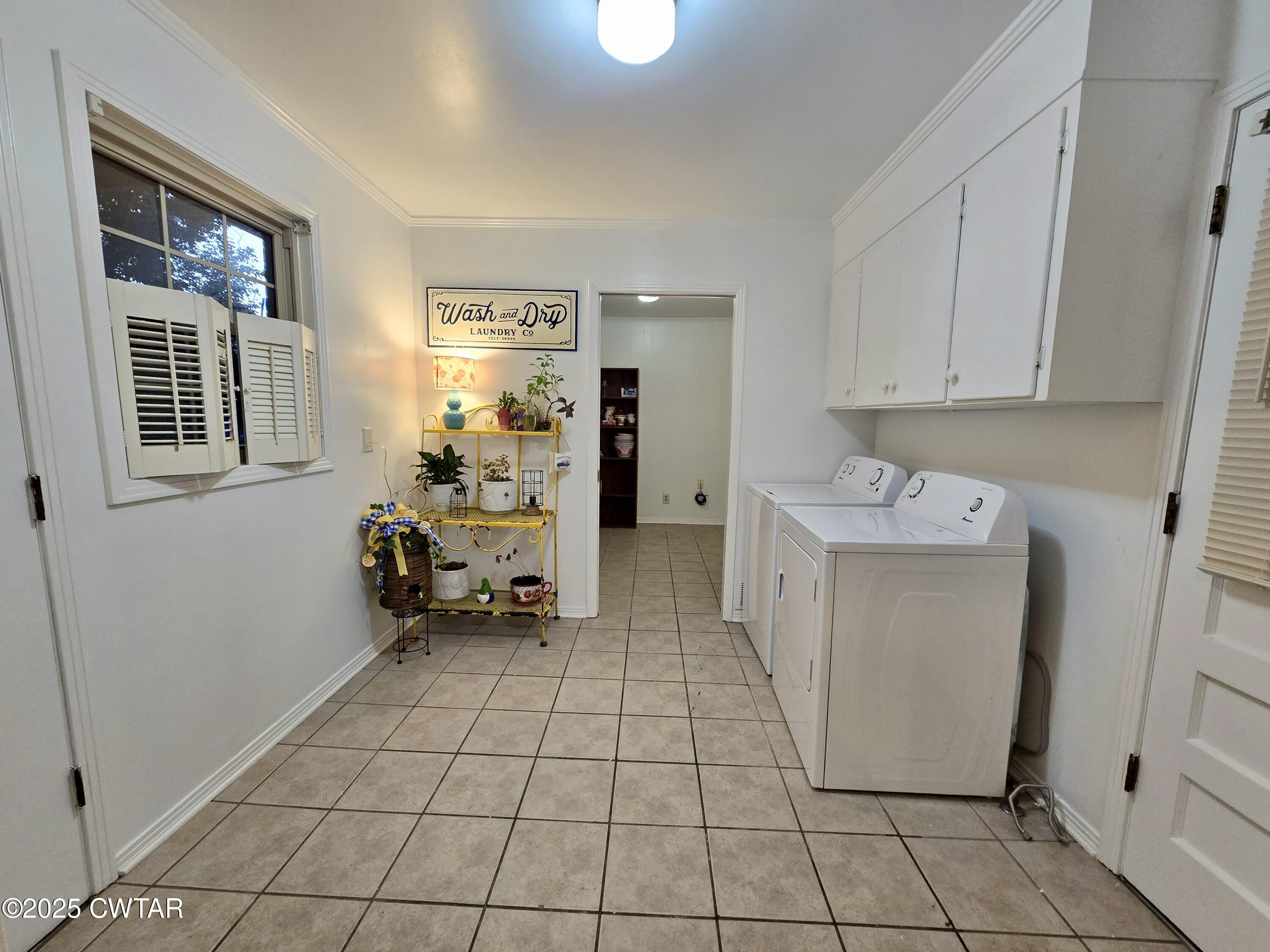 2 Ayers Drive Jackson, TN 38301 - Photo 13 of 17 a utility room with cabinets