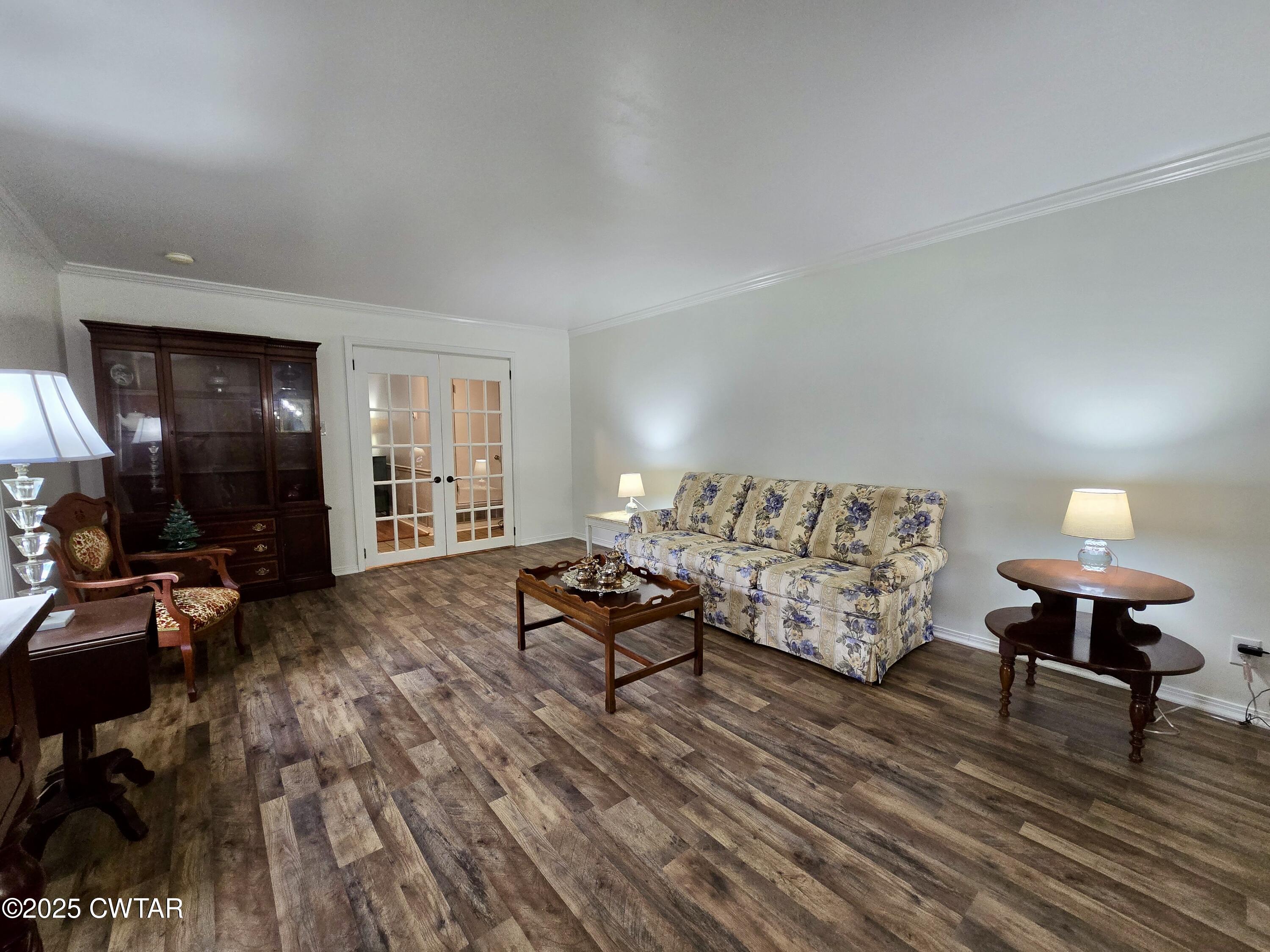 2 Ayers Drive Jackson, TN 38301 - Photo 3 of 17 a living room with furniture and a flat screen tv