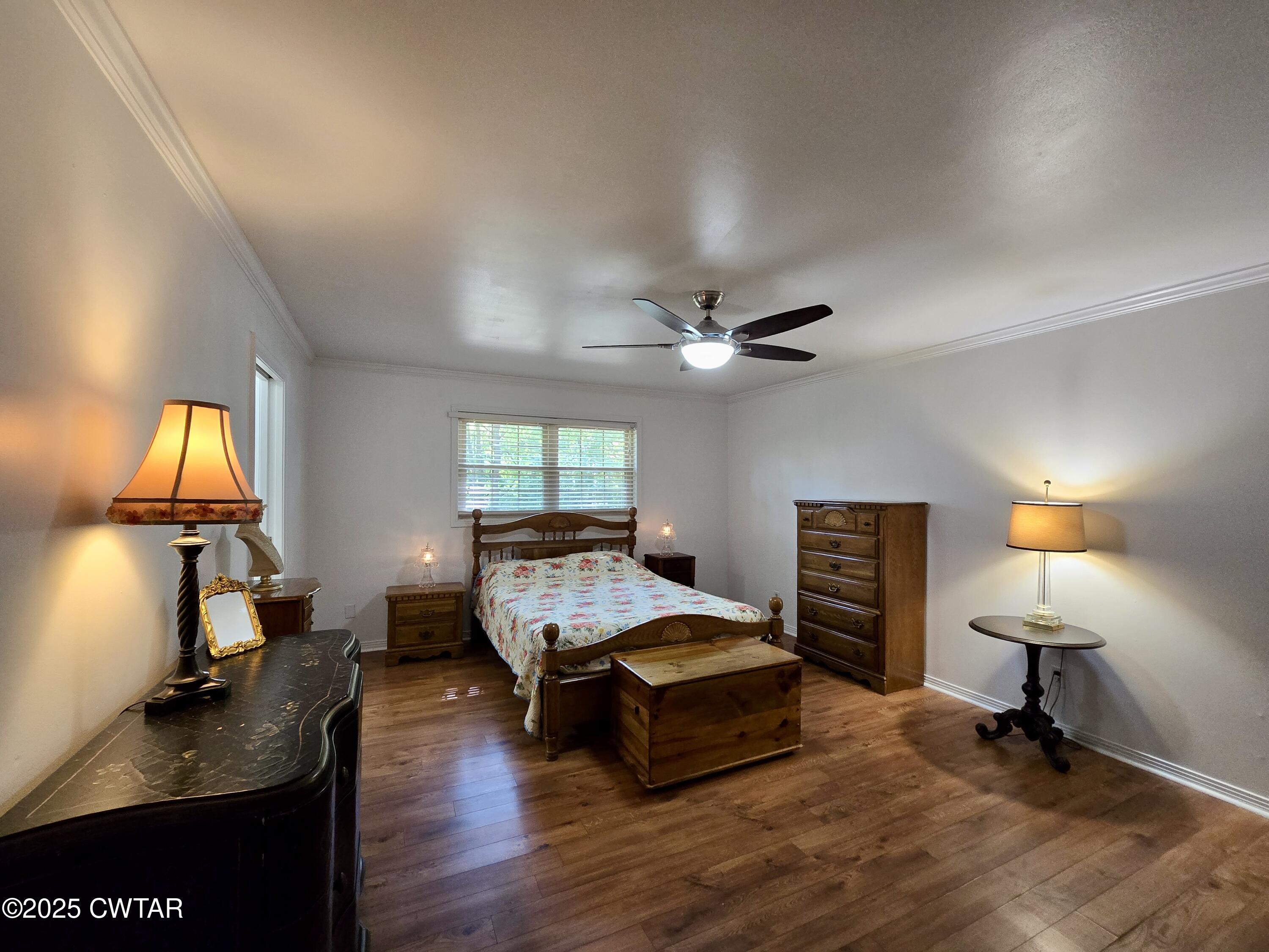 2 Ayers Drive Jackson, TN 38301 - Photo 7 of 17 a bedroom with furniture and a mirror