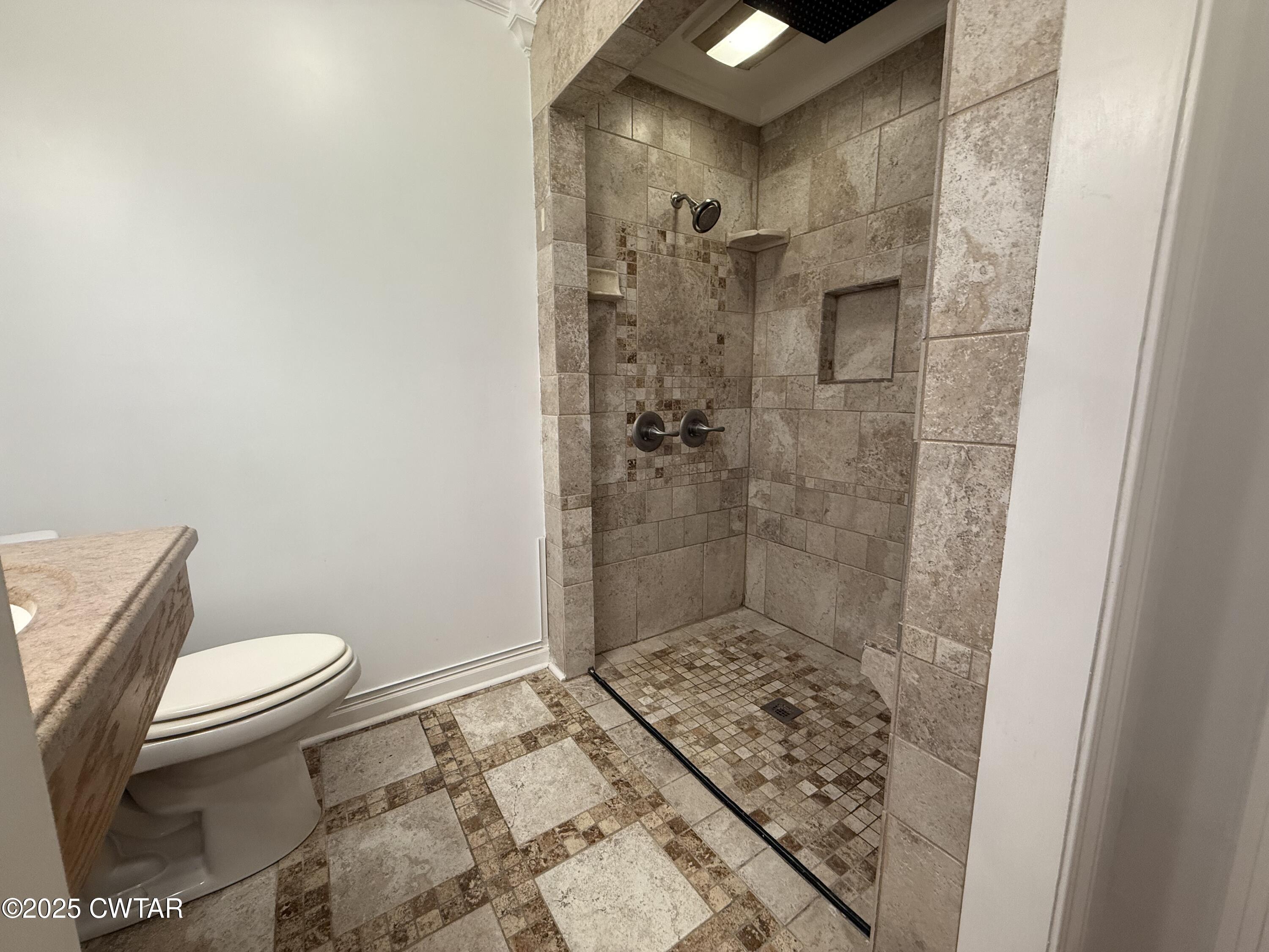 2 Ayers Drive Jackson, TN 38301 - Photo 8 of 17 a bathroom with a sink and a toilet