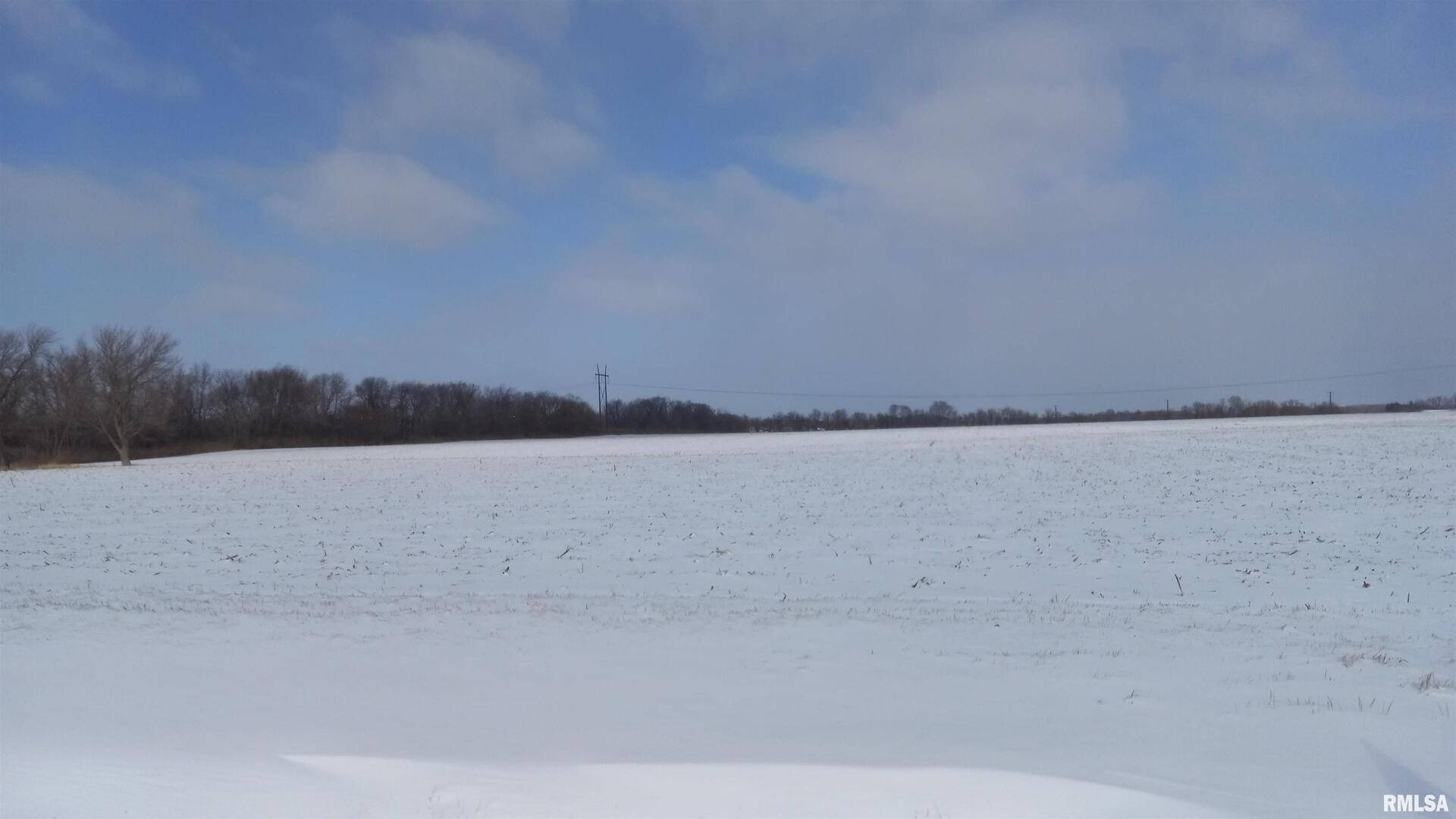 a view of swimming pool and lake in background