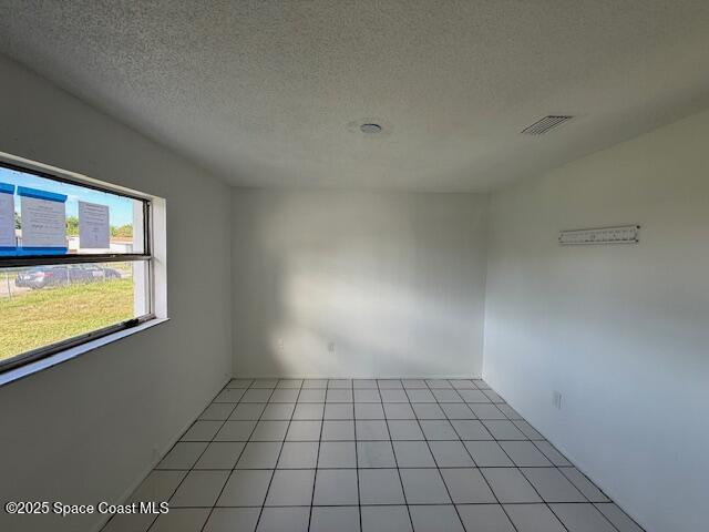 809 Poplar Lane Melbourne, FL 32901 - Photo 14 of 21 a view of an empty room and window