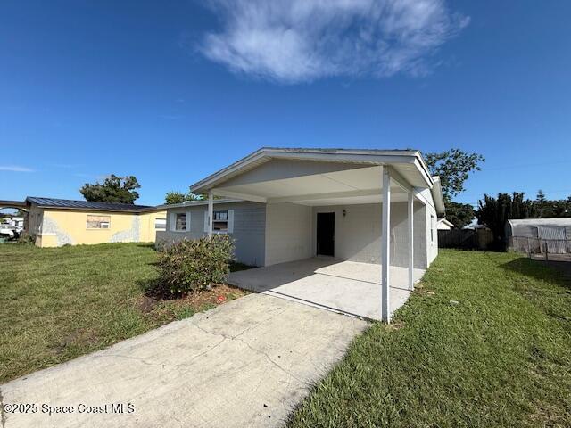 809 Poplar Lane Melbourne, FL 32901 - Photo 3 of 21 a view of house with outdoor space