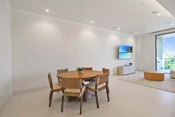 a kitchen with stainless steel appliances a refrigerator and a sink