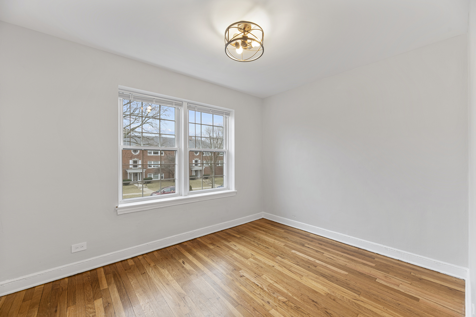 132 Ridge Avenue, Unit 2 Evanston, IL 60202 - Photo 11 of 14 an empty room with a window