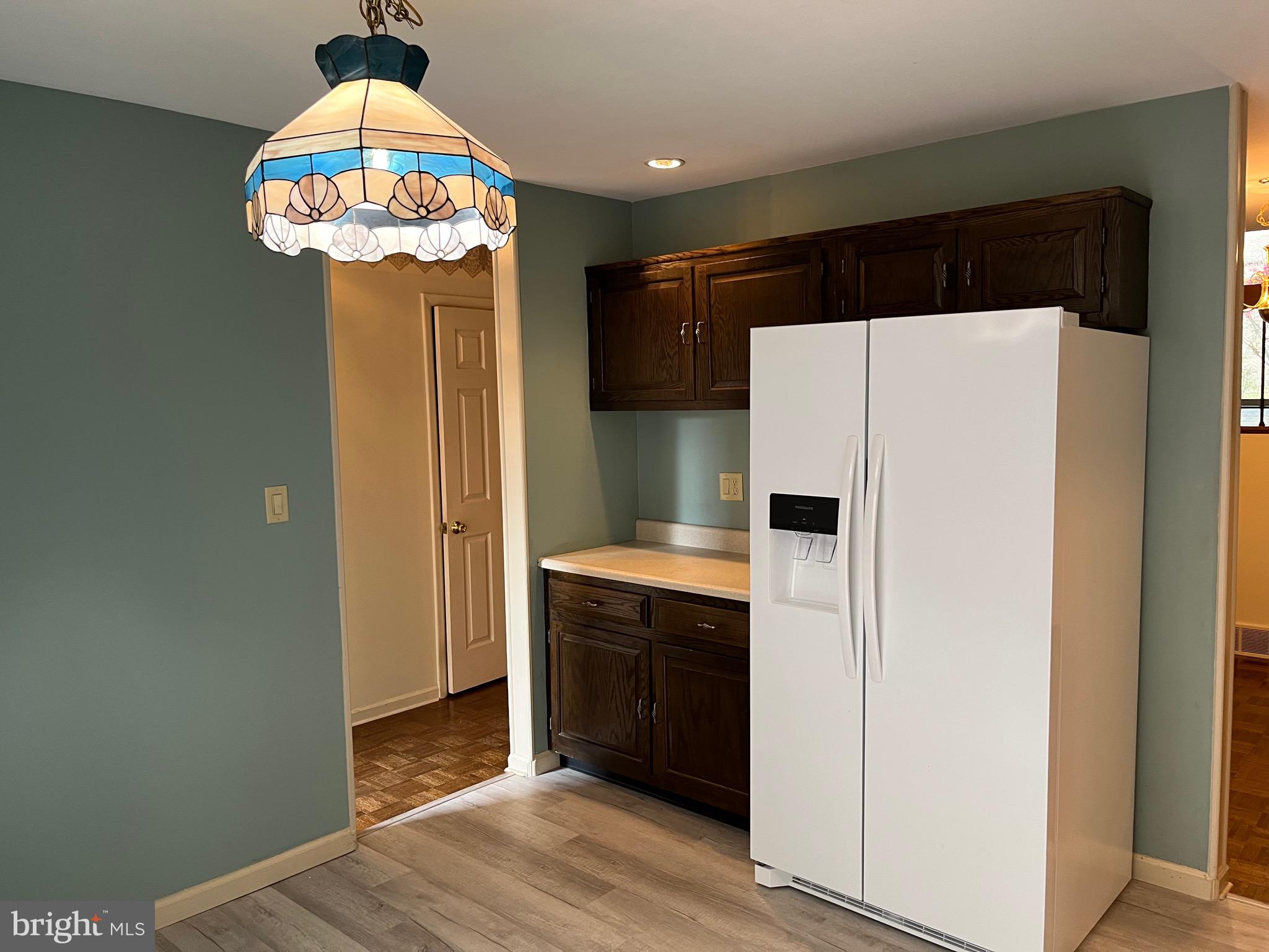 70 Winged Foot Drive Reading, PA 19607 - Photo 11 of 19 a kitchen with stainless steel appliances a refrigerator and a chandelier