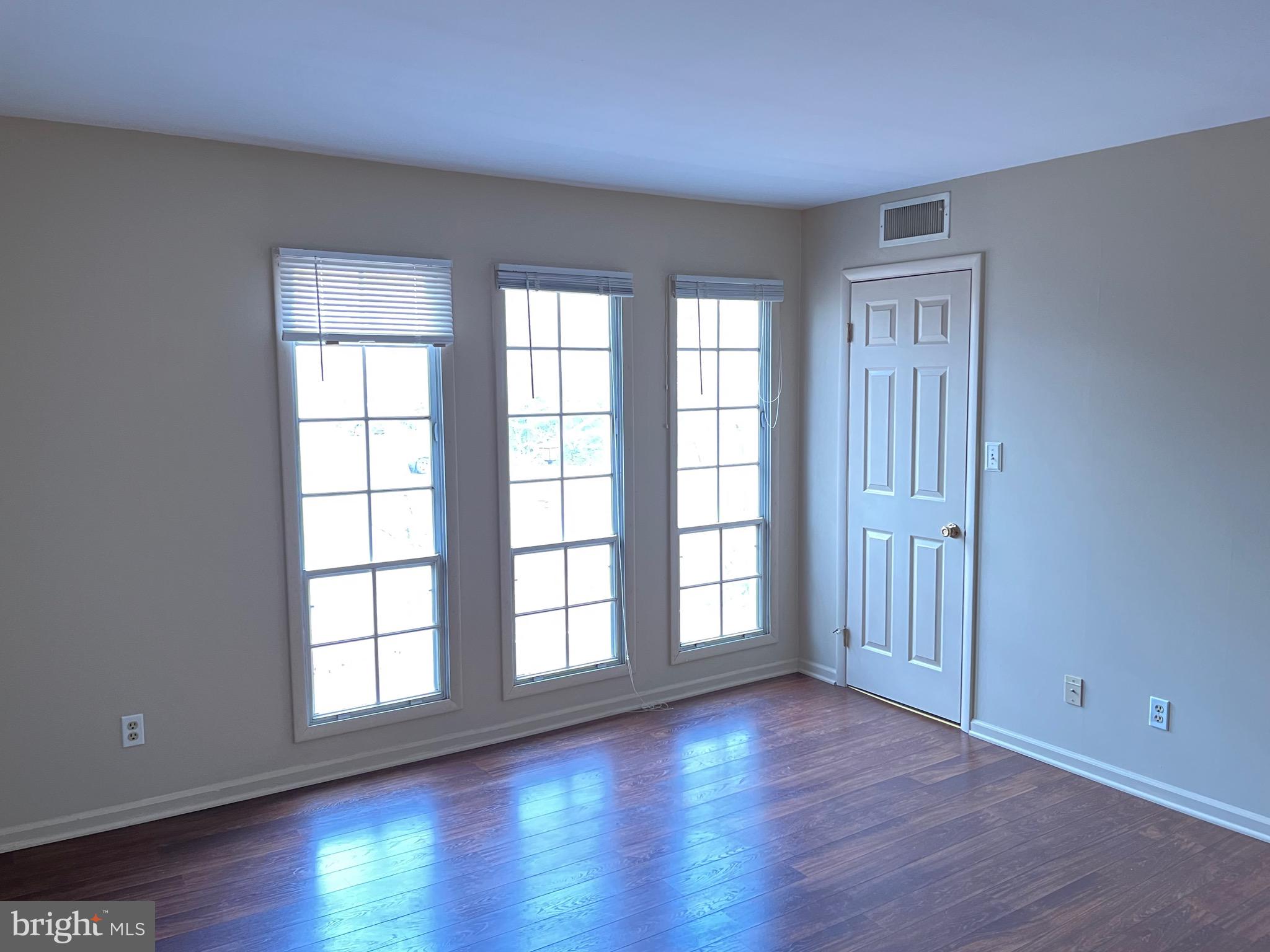 70 Winged Foot Drive Reading, PA 19607 - Photo 16 of 19 wooden floor in an empty room with a window